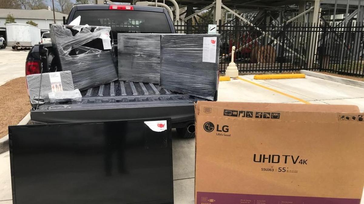 Two Gulfport men are accused of selling these gutted TVs near the Mardi Gras parade route in Slidell on Sunday, Jan. 28, 2018.