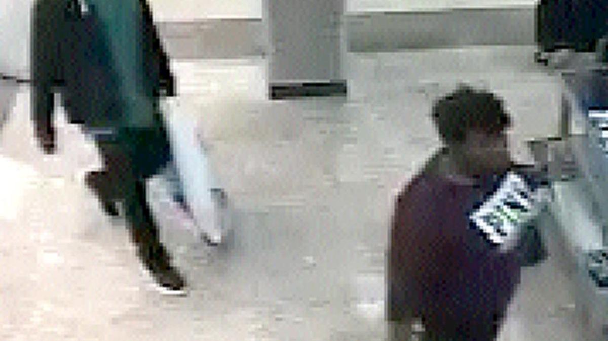 Surveillance photos show suspects police are looking for in connection with thefts from Champs Sports in Edgewater Mall on Jan. 29, 2017.
