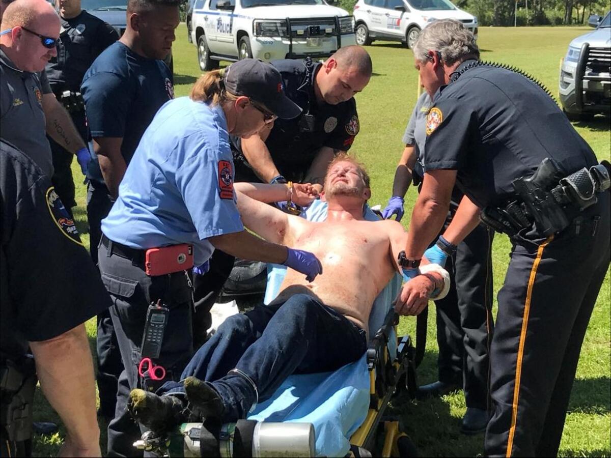 Lowrey Roland Webster IV, 38, of Slidell was arrested on two counts of carjacking and the charge of felony eluding. Webster is seen being handcuffed to a gurney after eluding police.