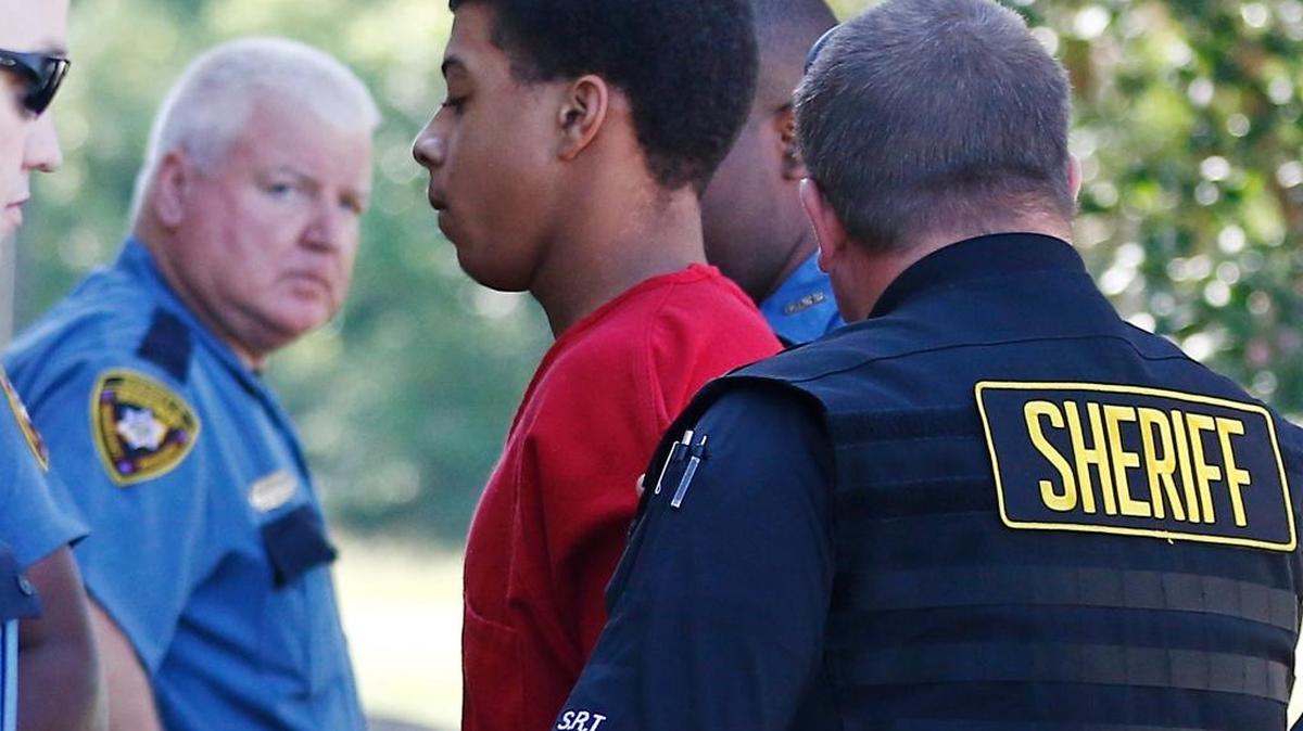 Dwan Wakefield, one of three men charged with murder in connection with the shooting death of Kingston Frazier, enters the Madison County Justice Court on Monday, June 26, 2017, in Canton, Miss. Madison County Justice Court Judge Bruce McKinley will consider the case against Byron McBride, Wakefield and D'Allen Washington, deciding whether there is enough evidence to bind the case over to a grand jury.