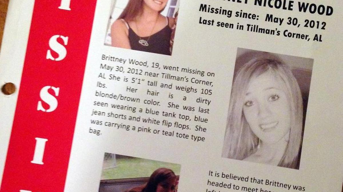 This Oct. 21, 2014, photo shows a flier about missing teenager Brittney Wood at her stepmother's home in Mobile, Ala. The teen hasn't been seen since May 2012 and is presumed dead, but 11 relatives and family friends have since been arrested as members of an alleged ring that swapped children for sex. Authorities say Wood could have been a key witness.