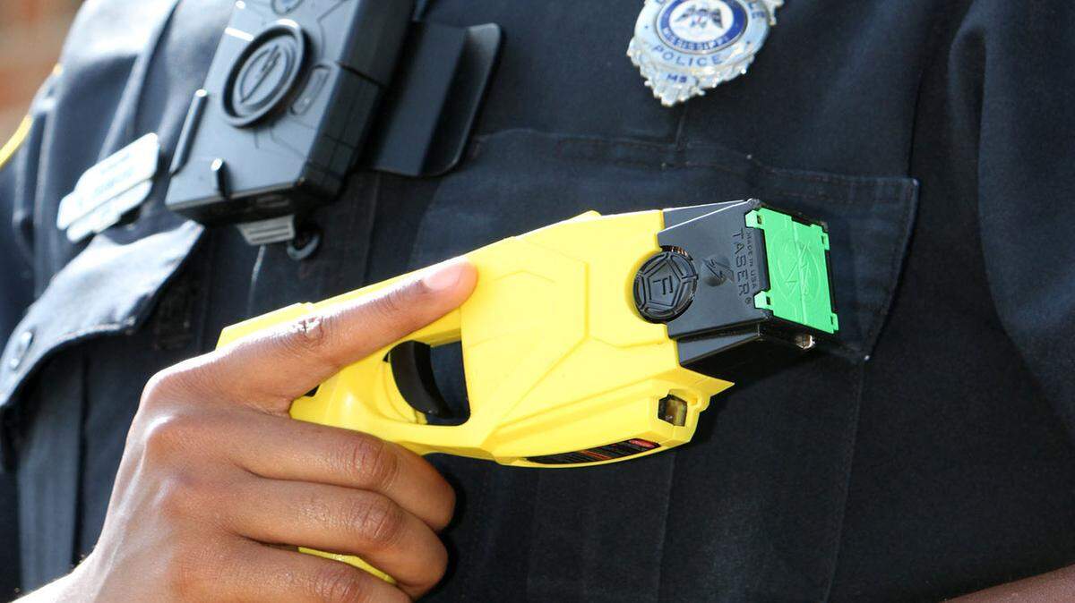 D'Iberville police officers including Sgt. Rasheeda Crawford carry a Taser that is supplemented by a body camera, a tool police have found to be helpful in all public encounters.