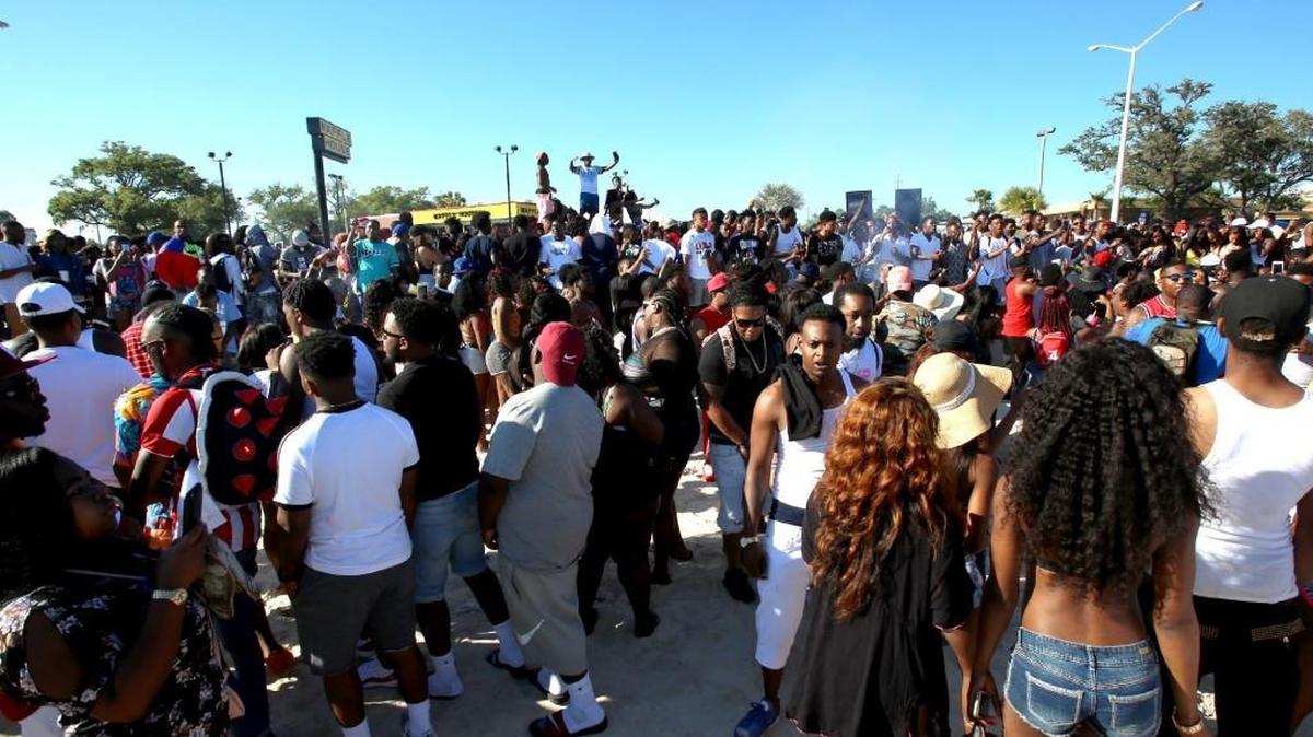 Biloxi Black Beach Weekend participants gather for an impromptu singalong on the beach on Saturday, April 8, 2017.