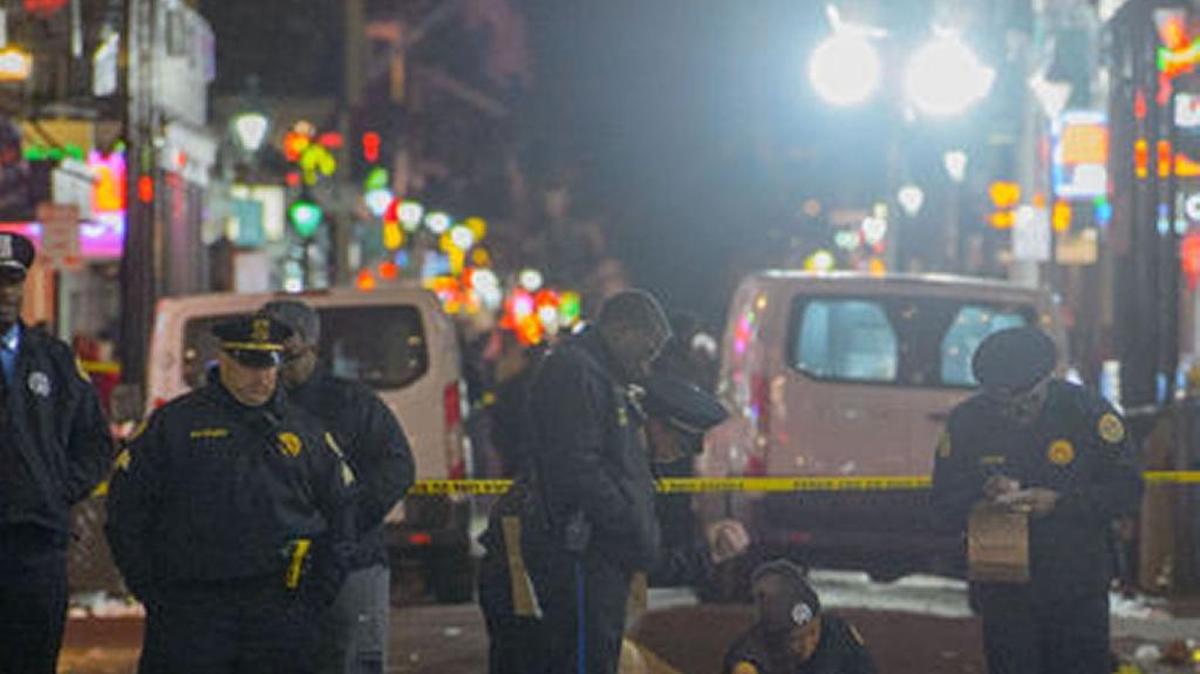 New Orleans Police Department investigators study a crime scene after 10 people were shot and one killed on Bourbon Street early Sunday, Nov. 27, 2016.