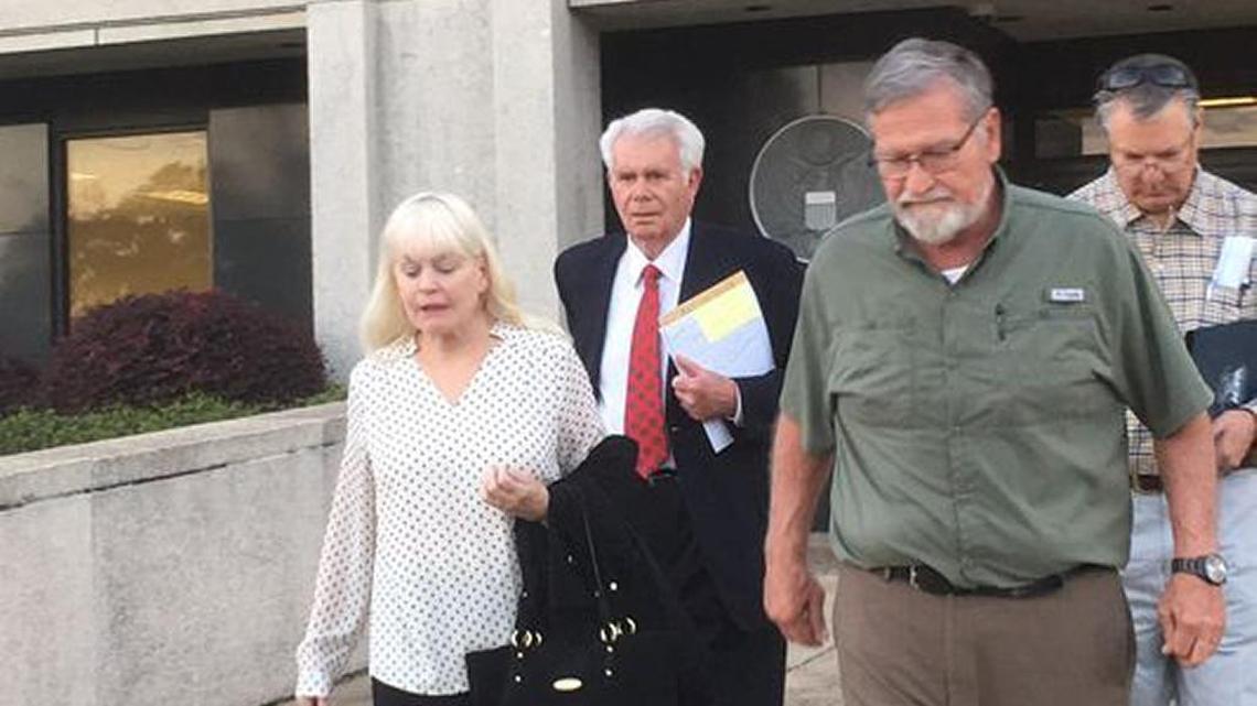 Dr. Albert Diaz of Gulfport, wearing the red tie, leaves the William M. Colmer Federal Courthouse after the first day of trial on Monday, Feb. 26, 2018. Diaz was on indicted in October 2016 on 16 counts in connection to a scheme officials say defrauded TRICARE and other health care providers by prescribing unnecessary compounds.