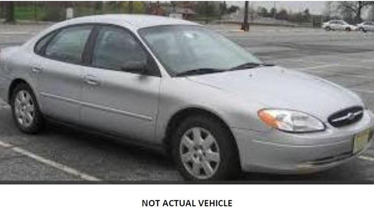 Gulfport police say a gray Ford Taurus such as this one was stolen from 39th Avenue on Tuesday by two armed men.
