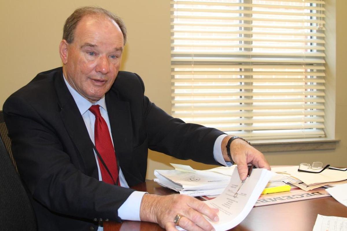 Harrison County prosecuting attorney Herman Cox