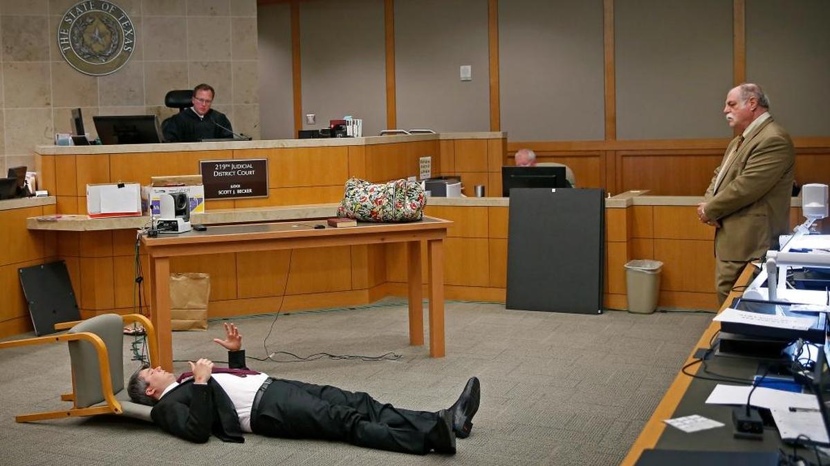 Defendant Jason Lowe, left, testifies as he answers questions for his attorney Andrew Farkas, right, during his murder trial in the death of girlfriend Jessie Bardwell at Collin County Courthouse in McKinney, Texas, Monday, Sept. 18, 2017. Lowe, says he and his girlfriend had taken the psychoactive drug GHB before having sex in a shower where she fell and struck her head.