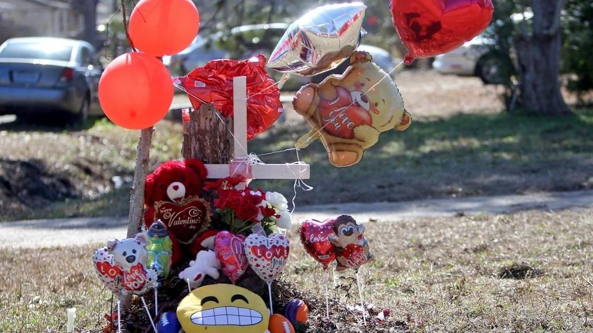 A memorial for 16-year-old Damien Thompson, Jr., who was killed over the weekend, sits near the intersection of Ponderosa and Bonita drives in Gulfport on Monday, February 2, 2017. "It was very hurtful that he was taken the way he was taken," said Catrease Hyde, Thompson's mother. "He loved everyone, tried to help everyone."
