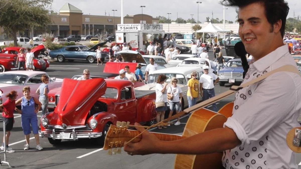 Brandon Bennett and the Heartbreak Orchestra play at the Edgewater Mall parking lot in Biloxi at a past Cruisin’ the Coast.