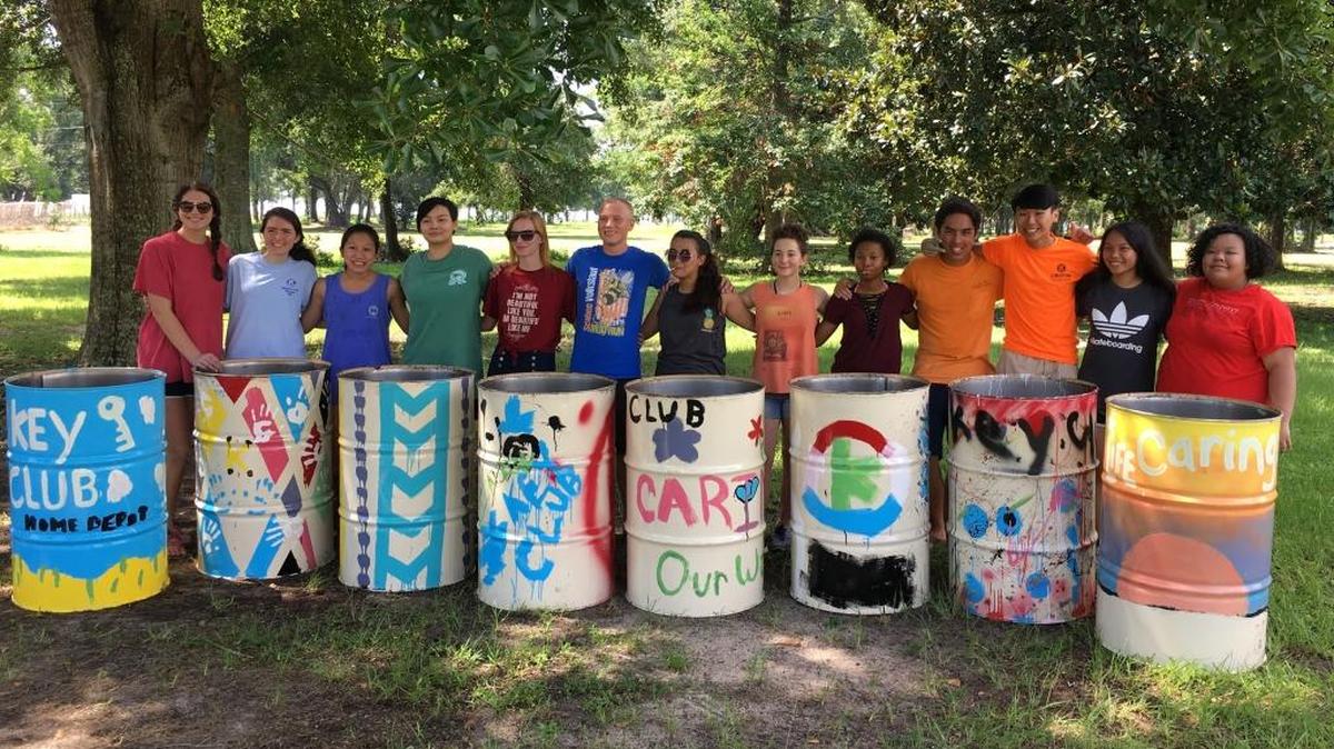 Key Club officers from area high schools volunteered their time to paint trash cans for the beaches. Participating are, from left, Shana Bourgeois, Stone County; Emily Wright, Harrison Central; Rose Boone, Pascagoula; Isabella Millerite, Resurrection; Emma Ballard, Stone County; Tyler Schumock, Pascagoula; Valencia Suite, Pascagoula; Rose Bourne, Pascagoula; David Rayburn, Gautier; Esmond Tsang, Biloxi; Faith Nguyen, Biloxi; and Kelly Chu, Biloxi.