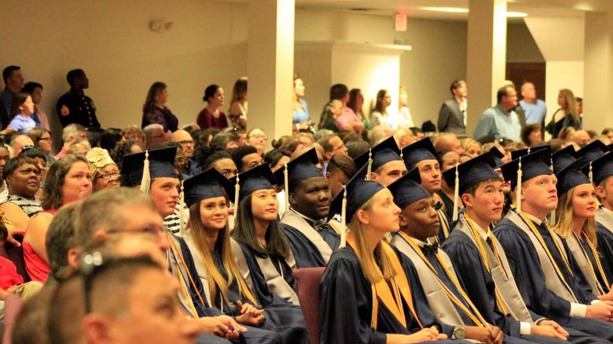 Christian Collegiate Academy Class of 2017 watches a slide show of memorable photos before receiving their diplomas on Friday, May 26, 2017.