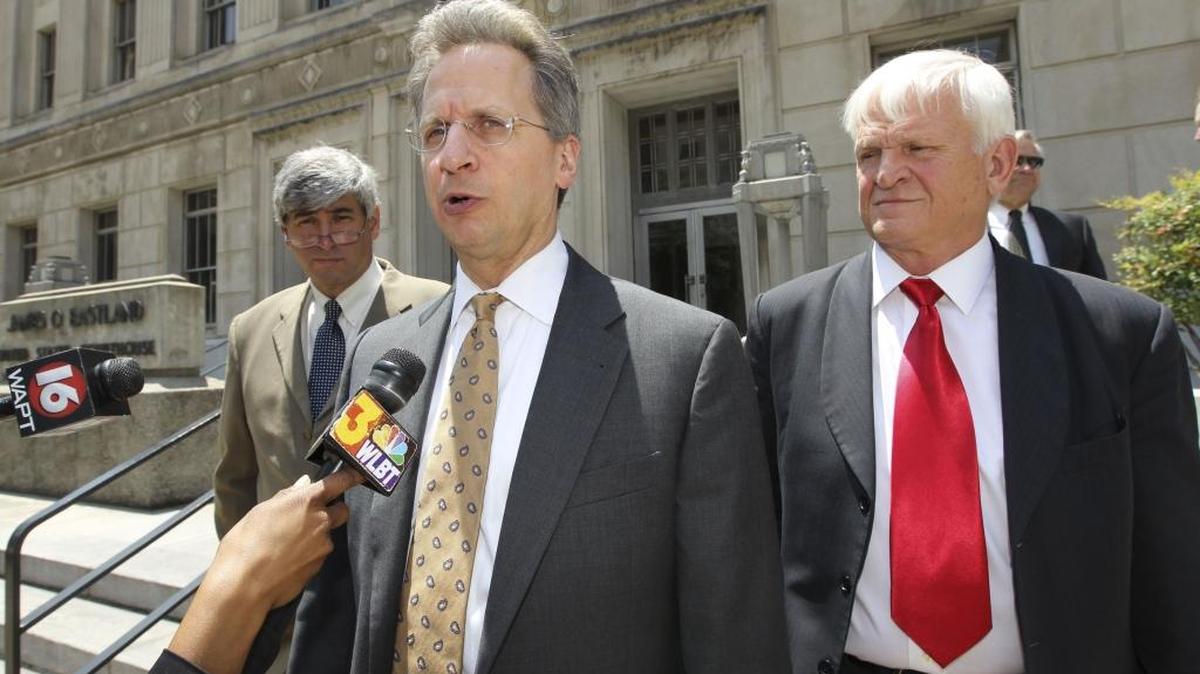 Former state Supreme Court justices Oliver Diaz, left, and Chuck McRae, right, flank David Debold, who worked on an appeal of former attorney Biloxi Paul Minor’s judicial bribery conviction. Diaz and McRae, shown here in 2011, were two of Minor’s staunchest supporters, before and after his 2007 conviction.
