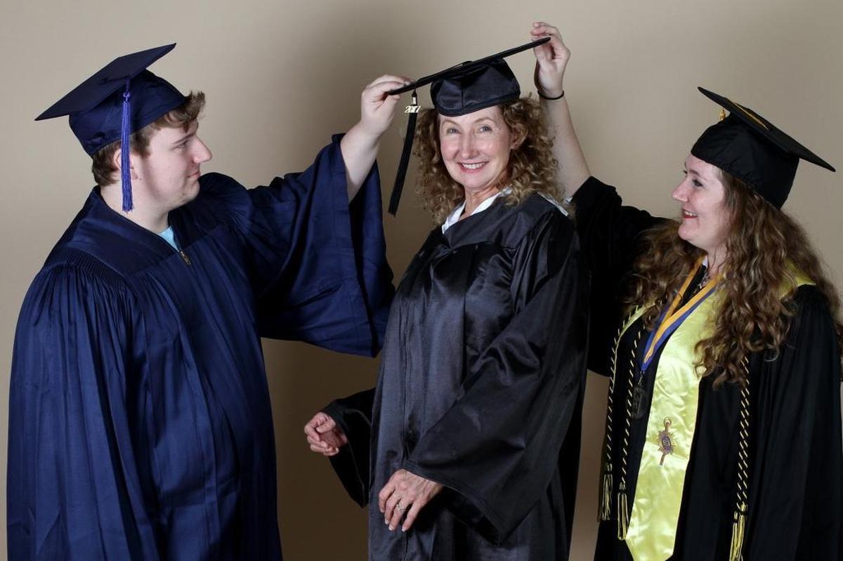 Thomas Loll, 20, his grandmother, Diane Robinson, 61, and mother, Ester Faye Clay-Arant, 37, of Ocean Springs were all receive college degrees that week. Photographer’s comment: I don’t often shoot portraits that I choreograph, but this was one, and I think it came out just right.