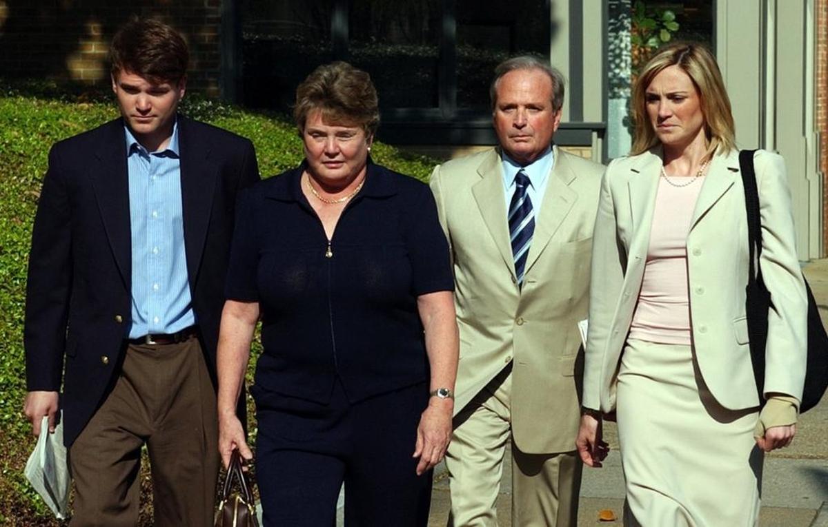The Minor family, pictured in 2005, prevailed in a Hurricane Katrina lawsuit filed against USAA insurance company. The plaintiff in the case is the Estate of Sylvia Minor, pictured in black, who died in 2009. At left is Stephen Minor, son of Sylvia and Paul Minor, center. Daughter Kathryn Minor is on the right.