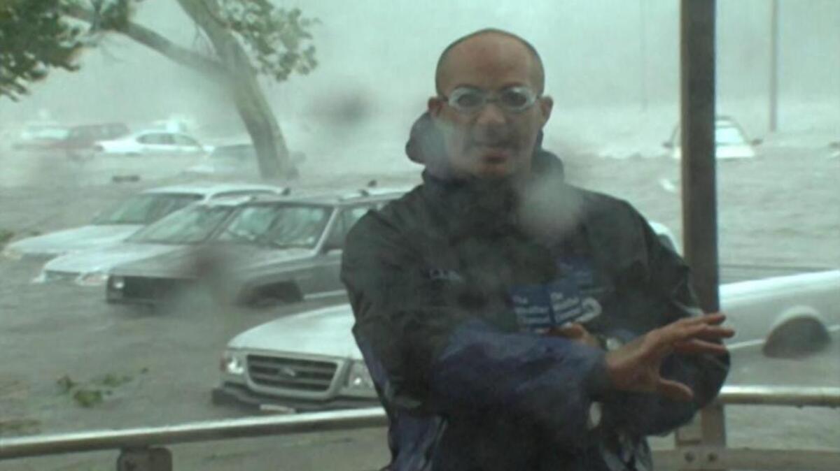 Storm tracker and now ‘AMHQ’ co-host Jim Cantore reports from the Armed Forces Retirement Home in Gulfport as Hurricane Katrina’s surge waters flood the parking lot, and then after the water receded.