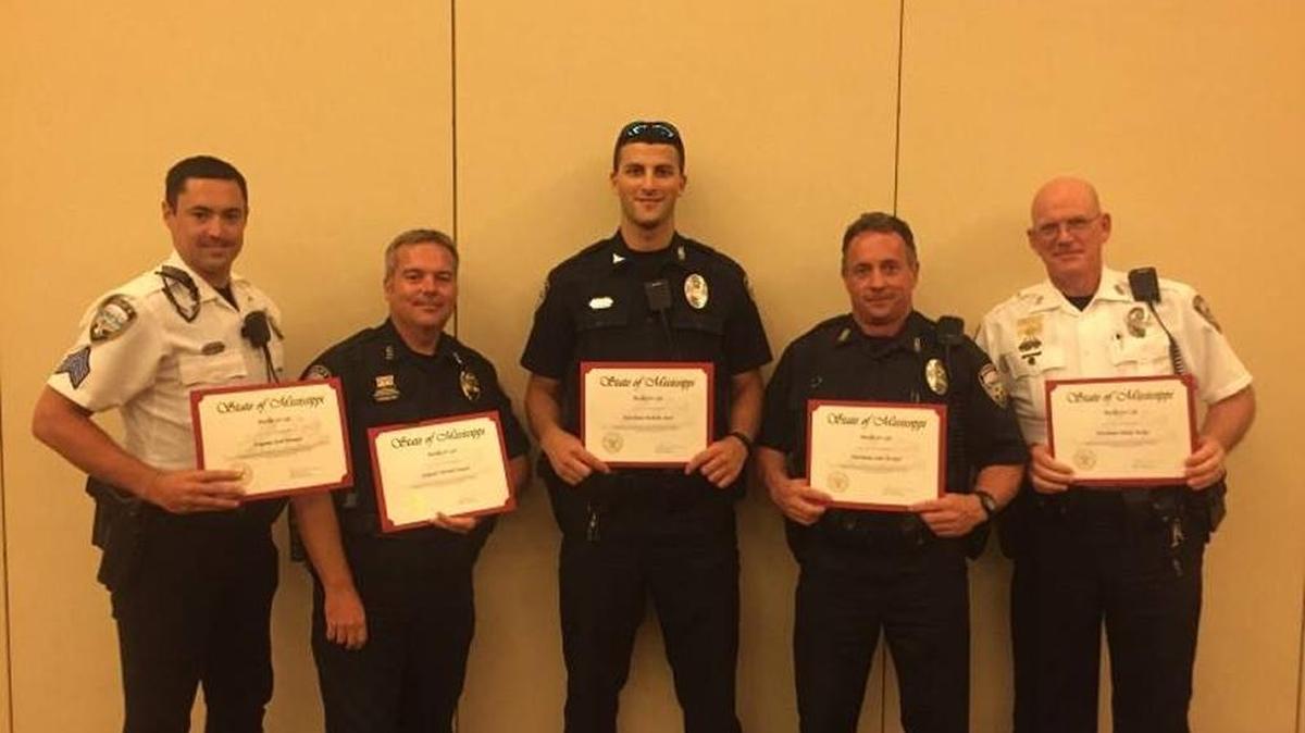 Gulfport police Sgt. Josh Bromen, left, has written the fourth-highest number of seat-belt and child-restraint violations in Mississippi. With him are other Gulfport officers recognized for similar efforts: Sgt. Mike Saucier and officers Nicholas Oster, Blake Tucker and John McNeill.