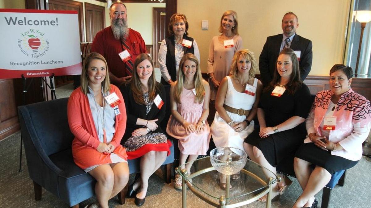 Leo W. Seal Innovative Teacher Grant winners at Hancock Bank in Gulfport on Friday, April 28, 2017. Front row, from left are Britany Oliphant of Oak Park Elementary, Letha Boudreaux of St. Stanislaus, Victoria Williams of St. Patrick, Dawn Coleman and Ashley Chennault of Ocean Springs Upper Elementary and Sharon Thompson of Trent Lott Academy. Back row, from left are Jeff Anderson of St. Stanislaus, Virginia McLaughlin of St. Martin Middle, Melissa Harris of Pass Christian High and Patrick Wadsworth of Gulfport High.