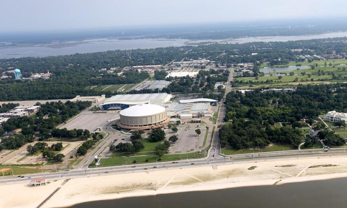 This aerial shot on July 30, 2015 shows the Coast Coliseum and U.S. 90 in Biloxi looking north. The Popp’s Ferry Extension will connect from the beach to Popp’s Ferry Road, veering to the west of the Coliseum parking garage.