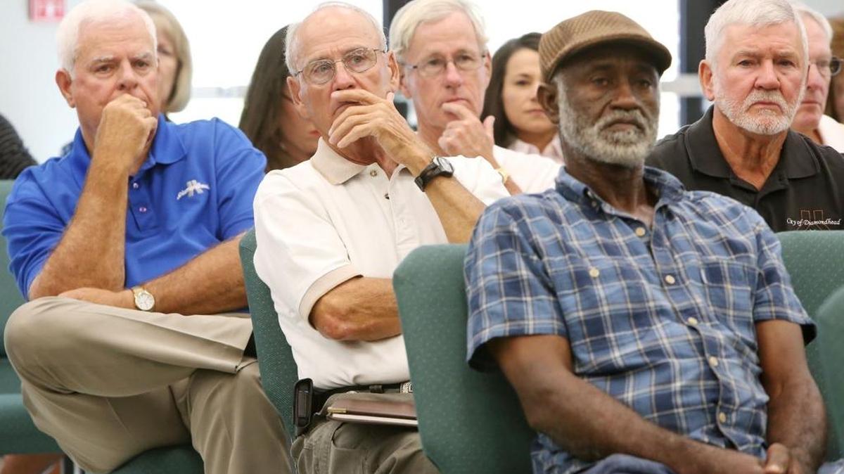 Residents listen to comments during a meeting at Diamondhead City Hall on Thursday to hear suggestions for how to spend the $750 million BP settlement for economic damages from their 2010 oil spill in the Gulf of Mexico.