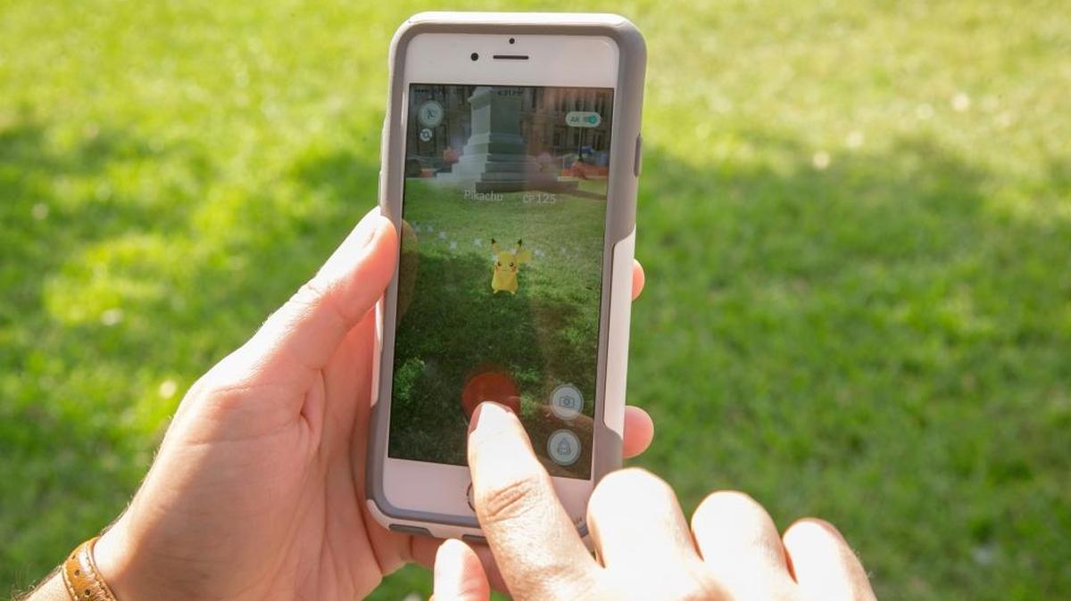 Sarah Boutwell plays the augmented-reality smartphone game “Pokémon Go” at the Capitol in Austin, Texas, July 11, 2016.