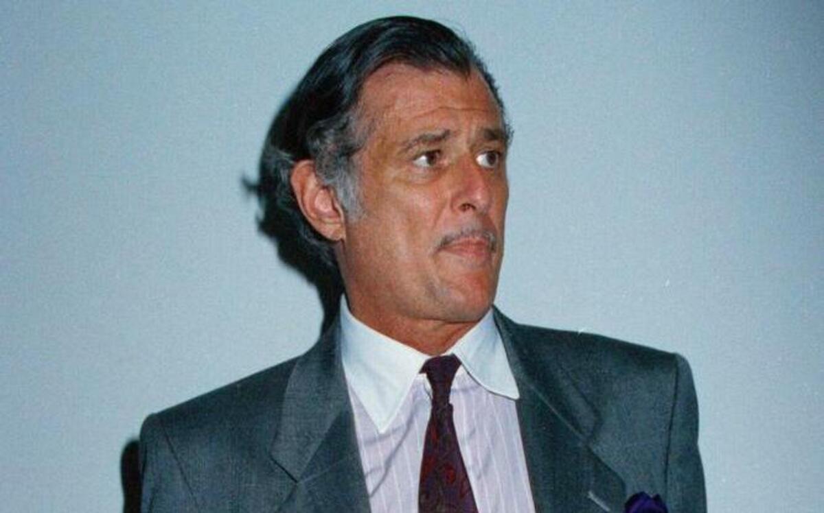 Frank Deford, then editor and publisher of The National Sports Daily, holds a proof of the final front page of the newspaper in 1991 at the paper's offices in New York. Award-winning sports writer and commentator Frank Deford has died. He was 78. Deford passed away Sunday in Key West, Florida, his family confirmed.