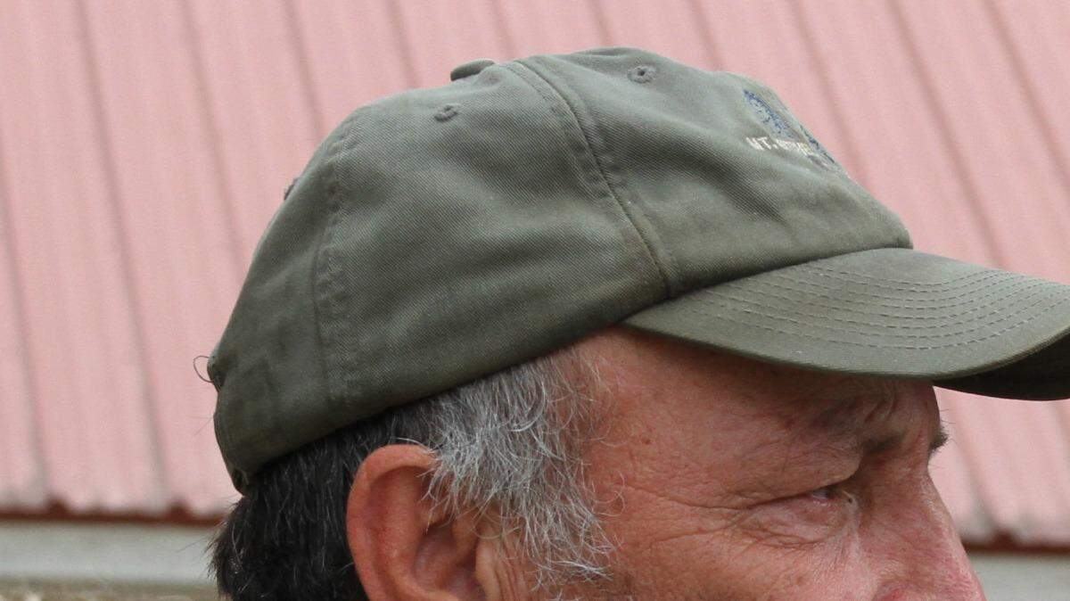 Frank Brown, father of B.J. Brown, outside the clubhouse at Muddy Joe's in Hancock County, after learning his son's body had been found in nearby Tranquility Lake.