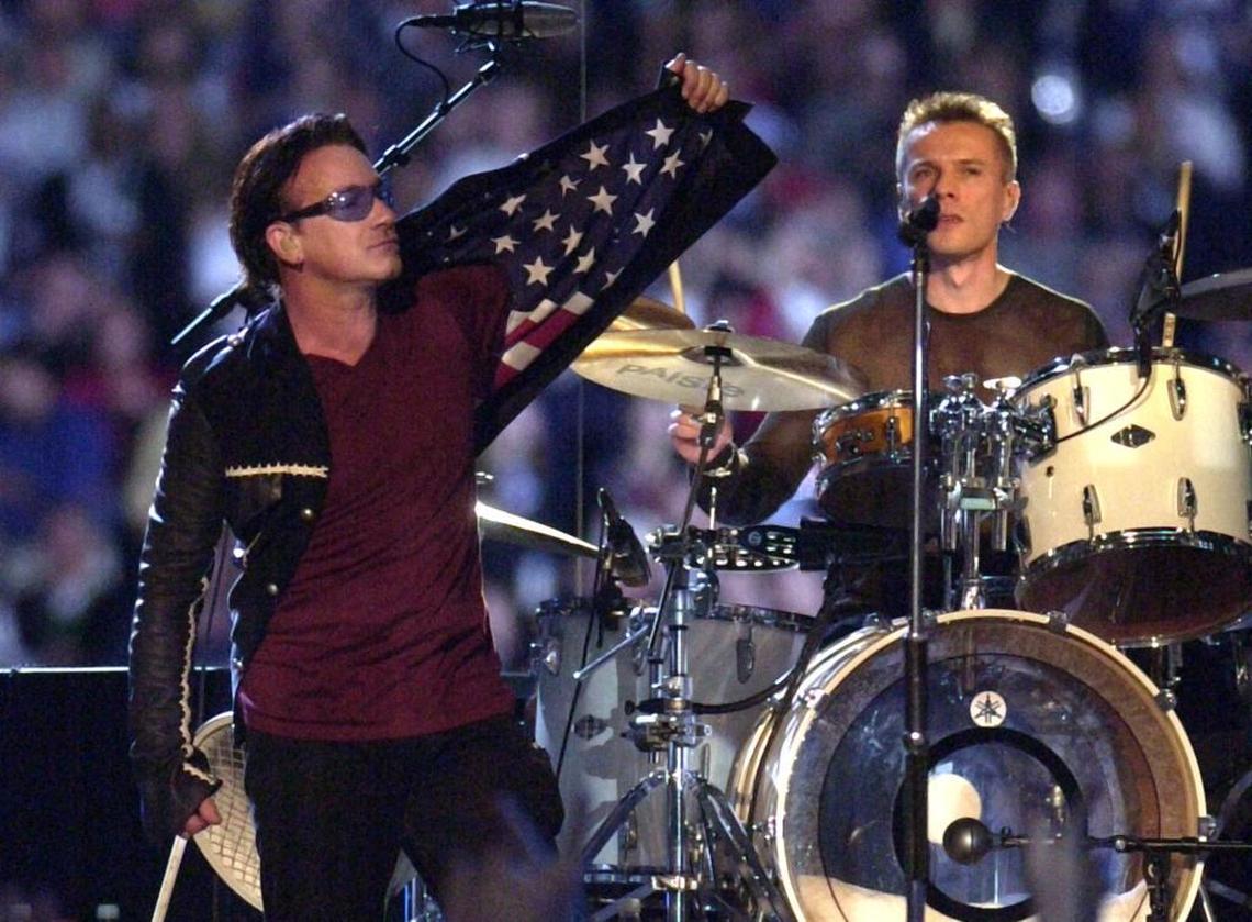 Bono and Larry Mullen Jr. of U2 perform at Super Bowl XXXVI in New Orleans.