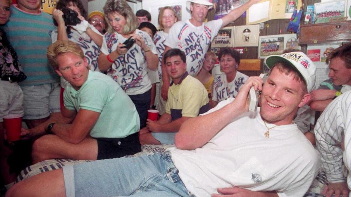 Brett Favre talks to the Atlanta Falcons on NFL draft day April 21, 1991, in his bedroom. Favre, a quarterback at USM, was drafted in the second round by the Falcons and was the 33 player chosen in the draft.