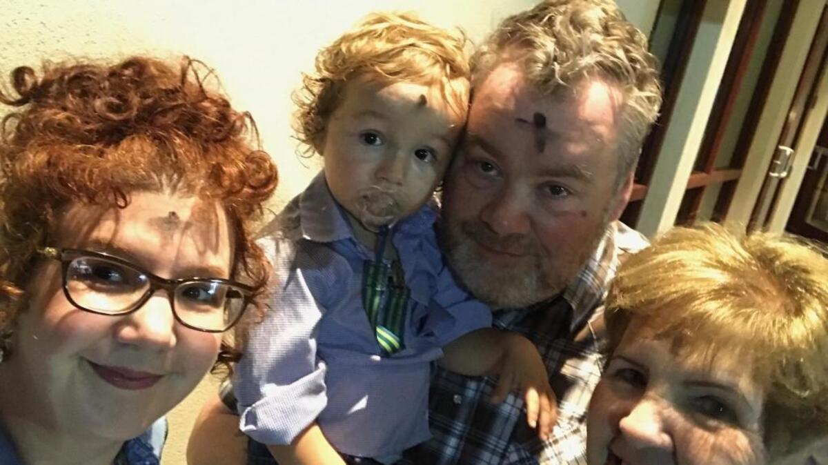 The Clark family, Dayna, Charlie, Jeff and Grammie, began the season of Lent by receiving ashes on their foreheads at St. Thomas the Apostle Catholic Church in Long Beach on Wednesday, March 1, 2017.