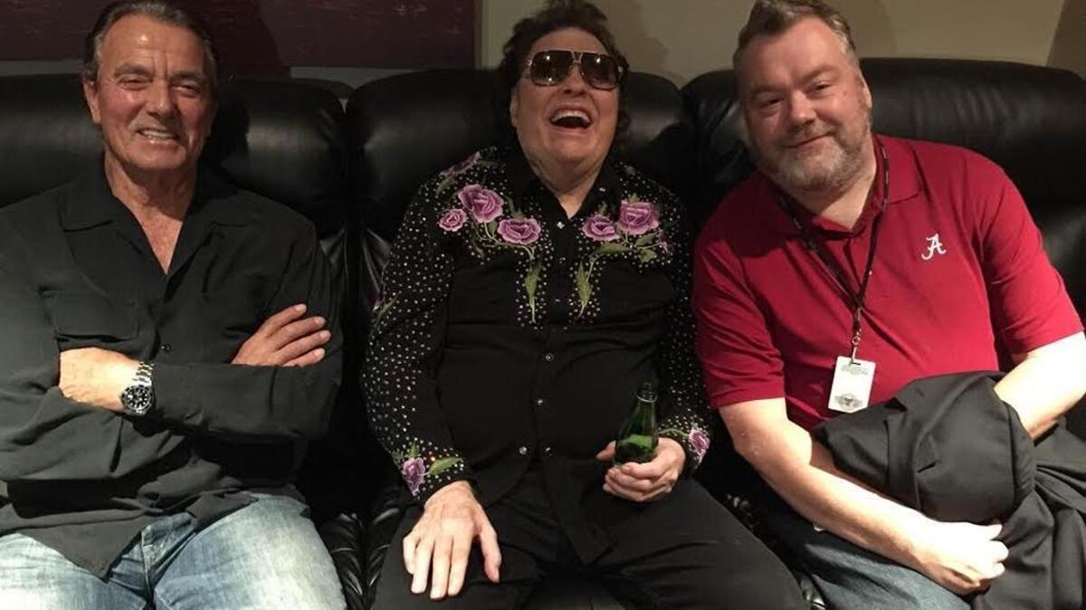 Sun Herald staff writer Jeff Clark recreates his own version of the famous “Elvis meets Nixon” photo with actor Eric Braeden and singer Ronnie Milsap in Biloxi on Saturday, August 13, 2016