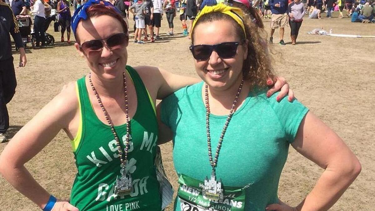 Sarah Burke, left, and Regina Zilbermints after completing a half-marathon in New Orleans.