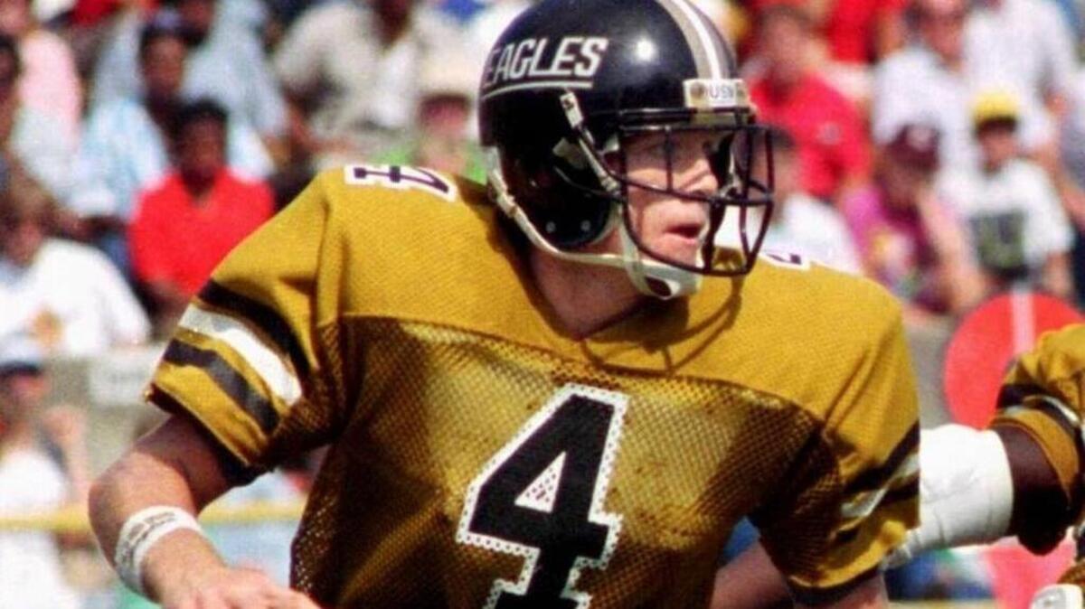Brett Favre looks for a receiver during game against Texas A&M in Jackson. Favre passed for over 1,000 yards in each of seasons as a Golden Eagle.