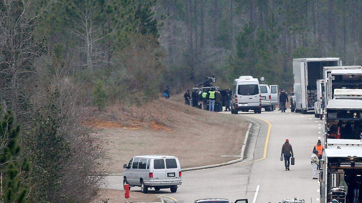 A crew from the movie 'Midnight Special' works to film a scene Thursday, February 13, 2014 on Mississippi 605 near Tradition. McCoy used her long-range camera lens to get this closer view of the action.