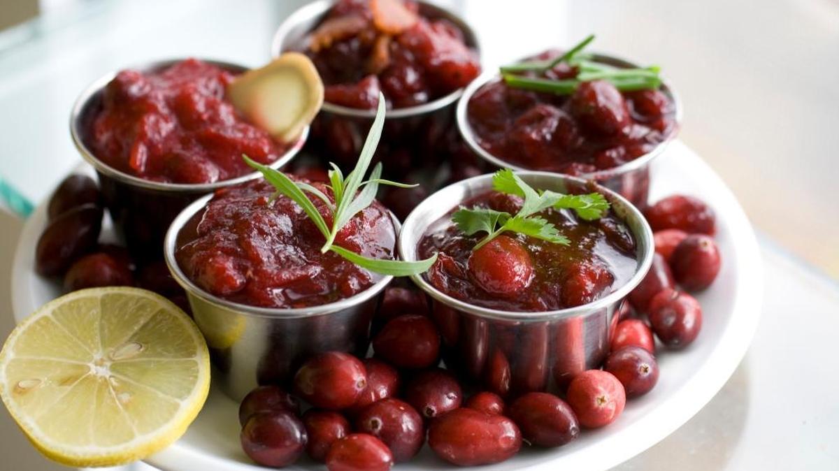My family makes several different kinds of cranberry sauces, which look nothing like these. These were made by a food writer with too much time on his or her hands. From bottom right clockwise, chipotle, lemon tarragon, ginger-miso, sweet and smokey, truffled.