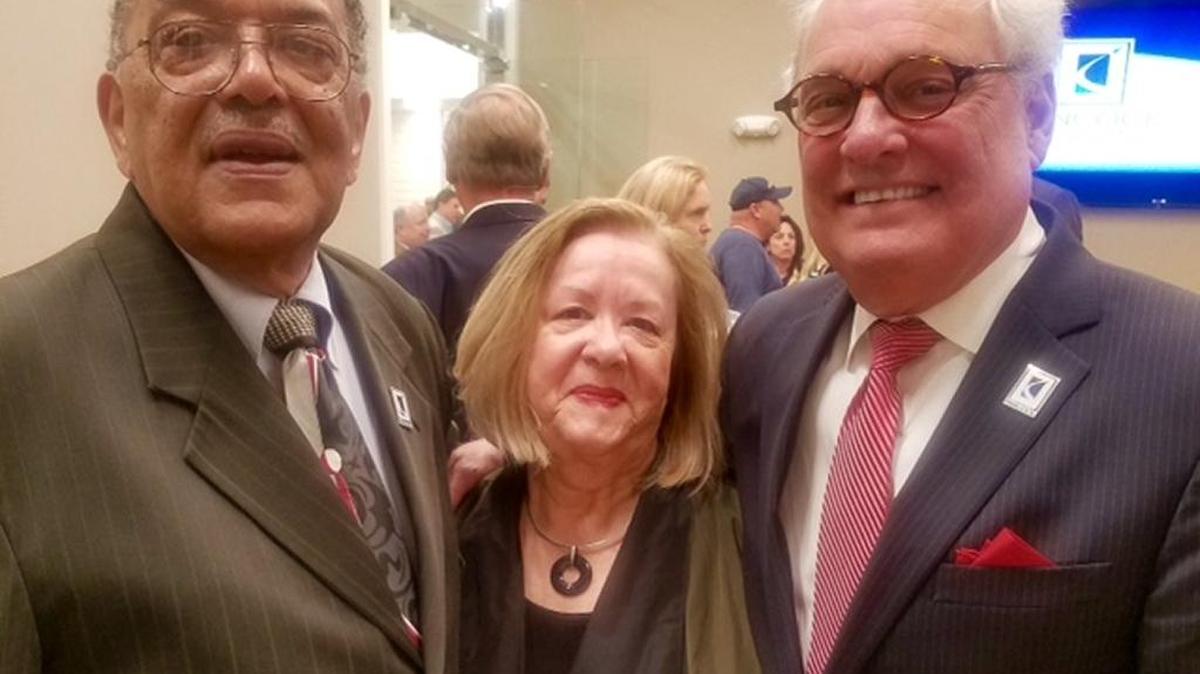 Former Hancock County Port and Harbor commissioner and secretary Harry Farve, left; Nancy Gex, the first woman commissioner; and president Robert R. Kane gather Thursday, Feb. 9, 2017, for the dedication and open house for the Robert R. Kane Administration Center in Kiln.
