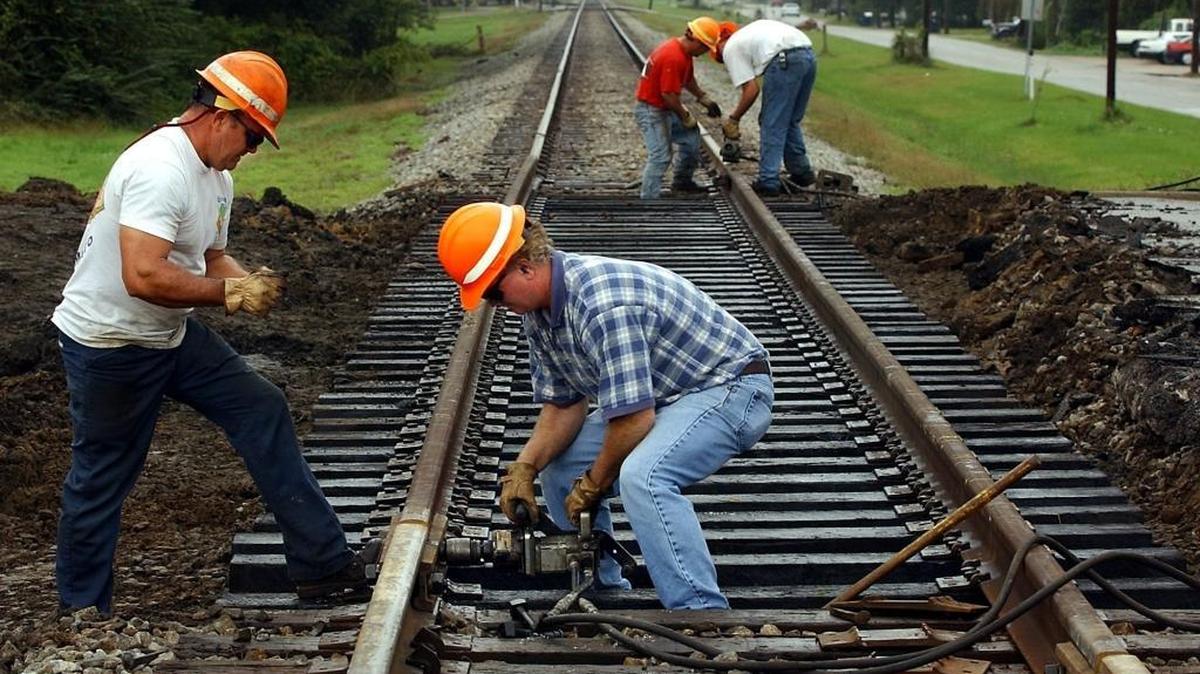 CSX Railroad workers work a project on Courthouse Road in Gulfport in this file photo. Emergency repairs to the tracks will be made on U.S. 49 Friday, blocking some traffic lanes.