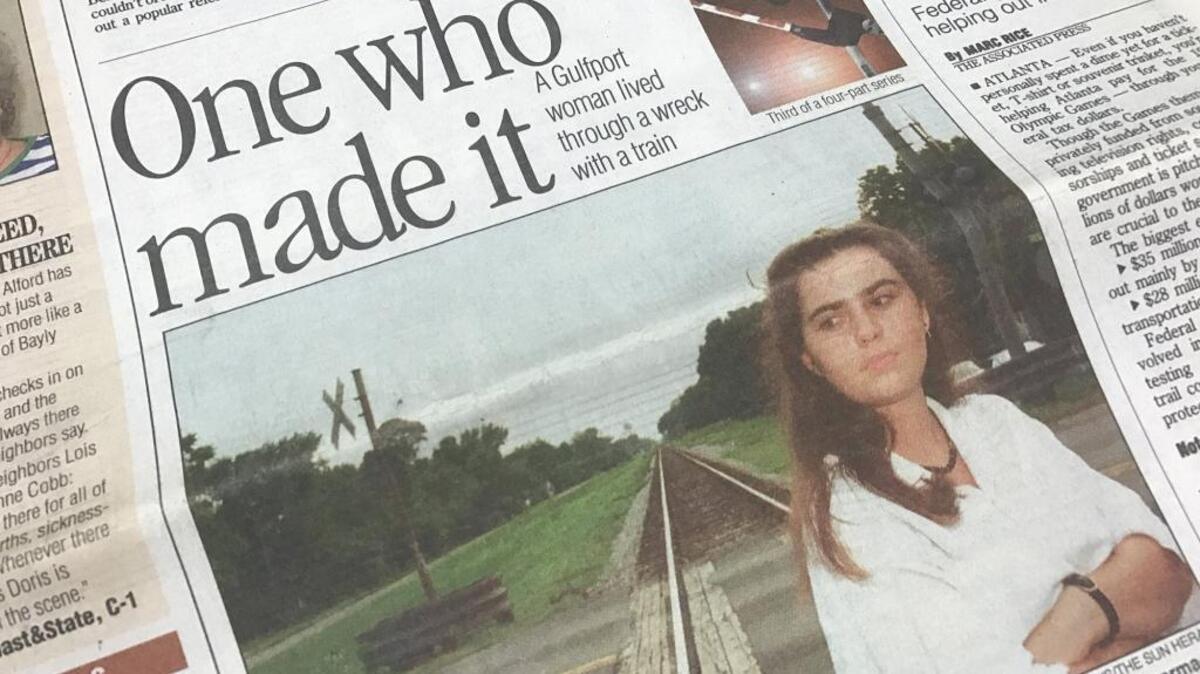 Stacey Simmons of Gulfport is shown in the Sept. 5, 1995 edition of The Sun Herald with a story about her car-train collision.