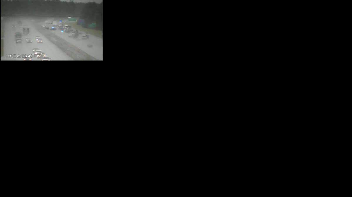 MDOT traffic cameras show snarled traffic and law enforcement on scene of Interstate 10 on Tuesday morning.