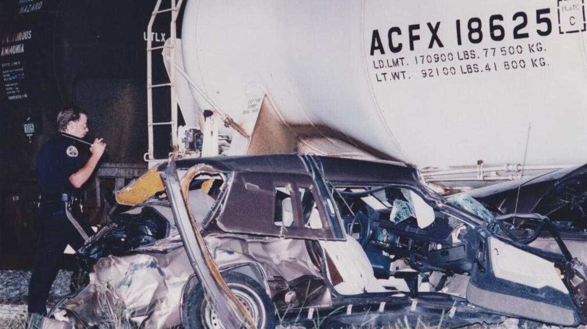 Long Beach police investigate the scene of a car-train accident at Cleveland Avenue on June 16, 1992 that left the driver in critical condition. The Sun Herald chronicled the danger of railroad crossings on the Coast in a 1995 series.