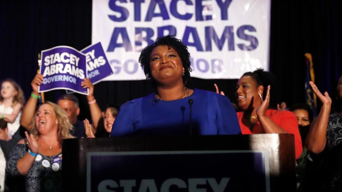 Georgia Democratic gubernatorial candidate Stacey Abrams smiles before speaking to supporters during an election-night watch party, Tuesday, May 22, 2018, in Atlanta.