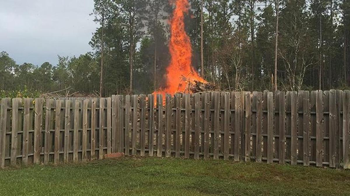 Mary Morgan took these photos of Jackson County burning debris from a new road it is building near her property. Others in the Quail Creek subdivision of St. Martin complained about ash coming into their yards and pools. The MDEQ told the county to stop on Thursday.
