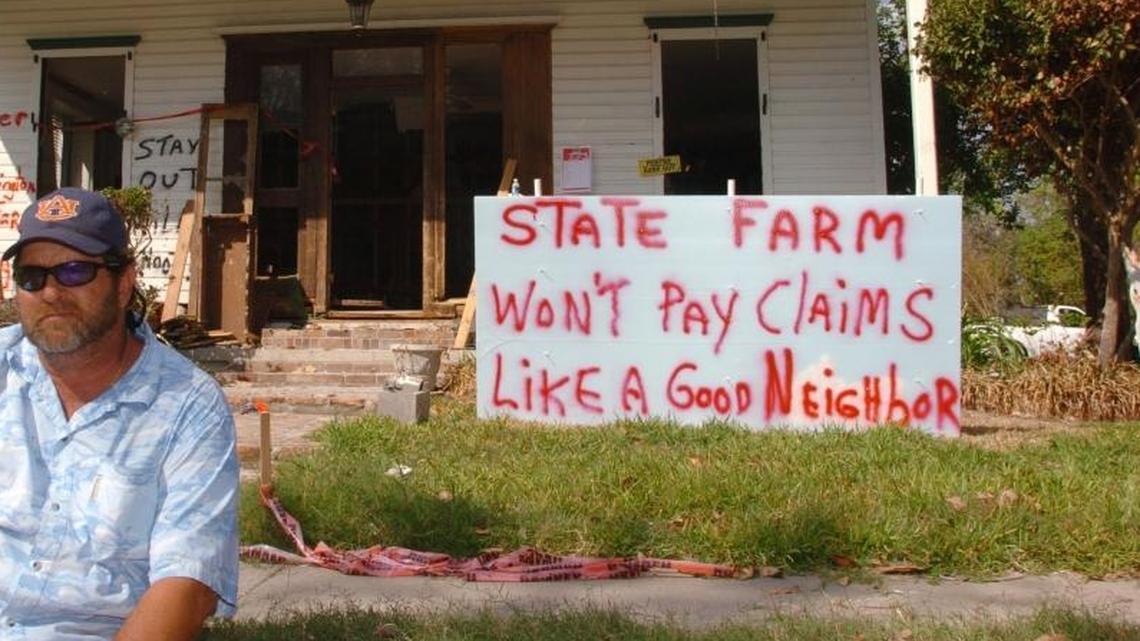 Steve Loper of Pascagoula is one of many policyholders who planted signs after Hurricane Katrina to protest their treatment by insurers that rejected claims of wind damage, maintaining storm surge covered by federal policies caused the losses.