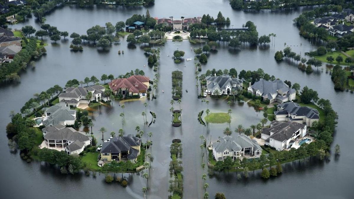 Flood waters rise Lakes on Eldridge North neighborhood near the Addicks Reservoir West Houston, Texas on Wednesday, Aug. 30, 2017. Hurricane Harvey inundated the Houston area with several feet of rain. Lawmakers are looking to rehabilitate the National Flood Insurance Program.