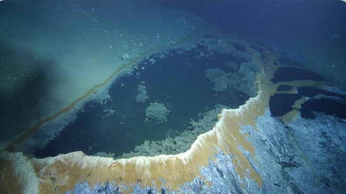 An image from the ROV Hercules aboard the Nautilus shows a brine pool with walls made up of barite.