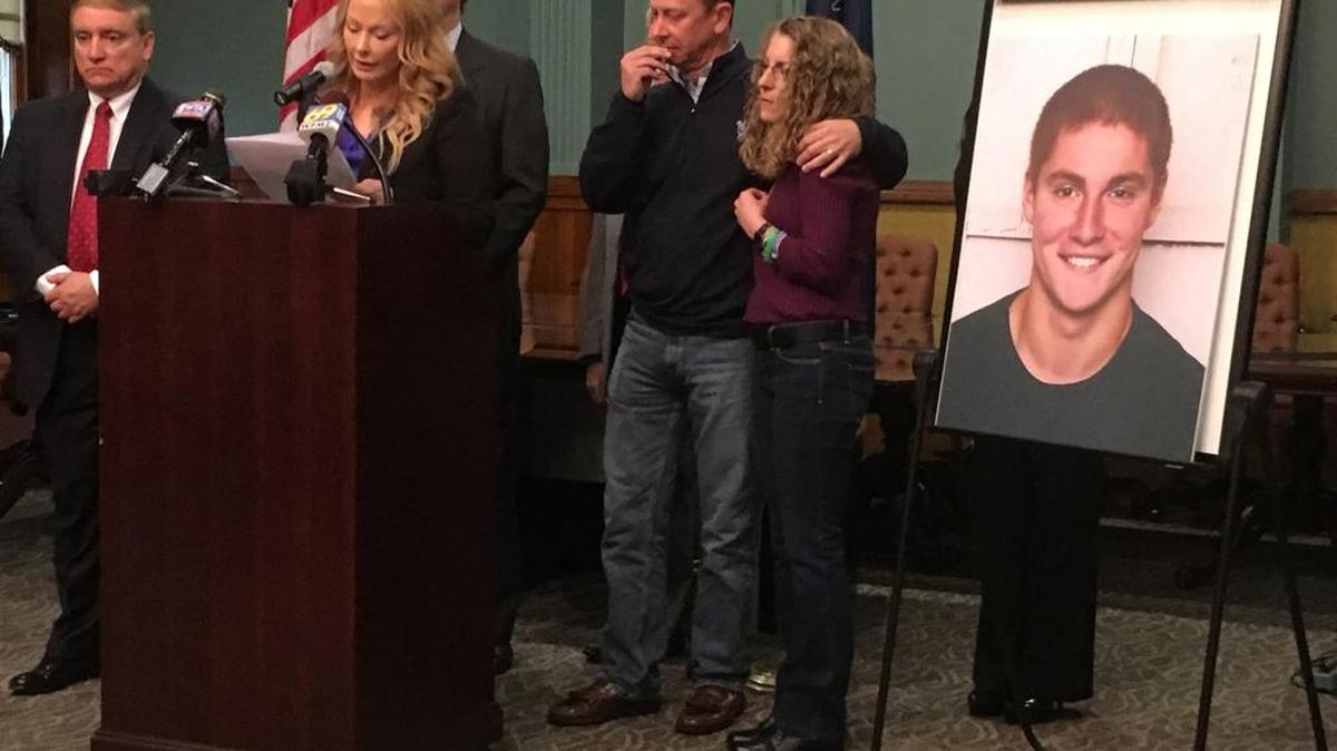 At podium is Stacy Parks, Miller Centre County District Attorney, with James and Evelyn Piazza, parents of Timothy Piazza, 19, of Readington Township, N.J. during a press conference at Bellefonte courthouse on Friday morning May 5, 2017.
