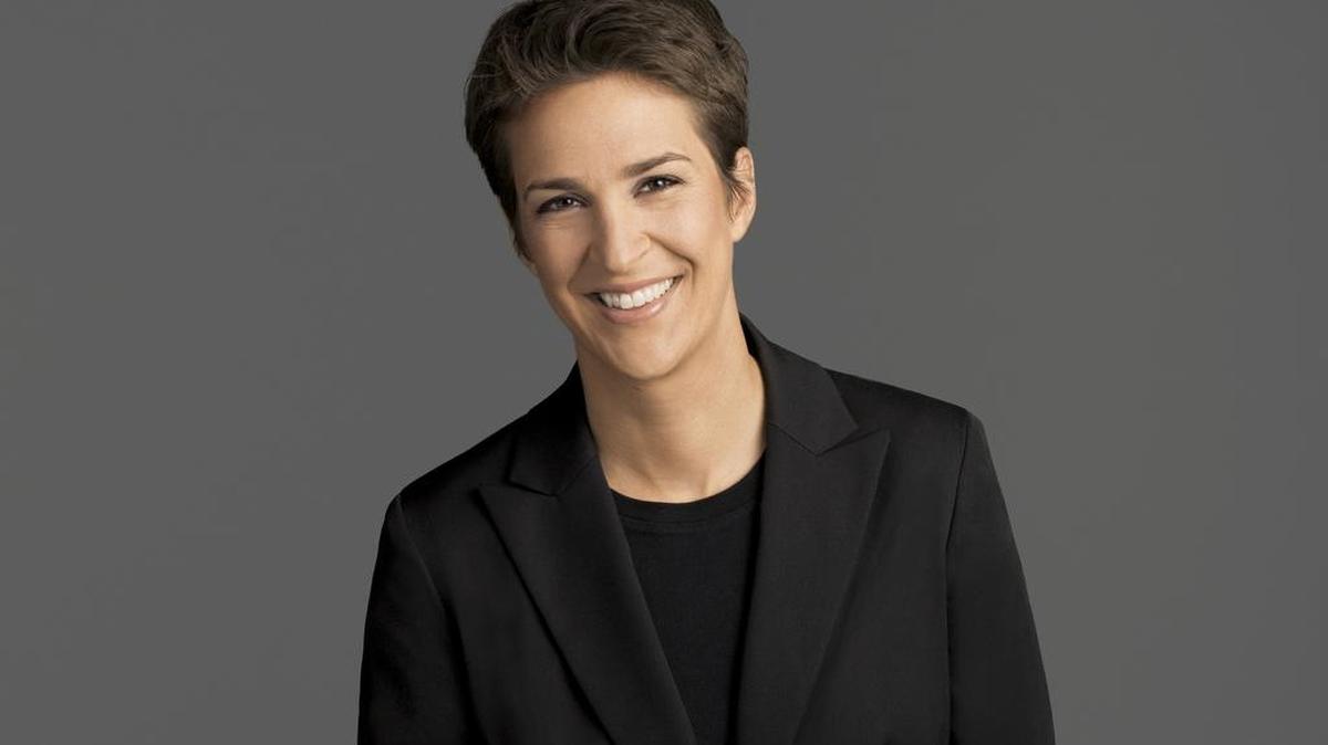 This image released by NBC shows Rachel Maddow, host of "The Rachel Maddow Show," on MSNBC. Maddow says she can track the mood of her liberal viewers by her ratings: they sank like a stone right after Donald Trump then slowly rose as civic engagement caught on. In February, the MSNBC host had her best month ever.