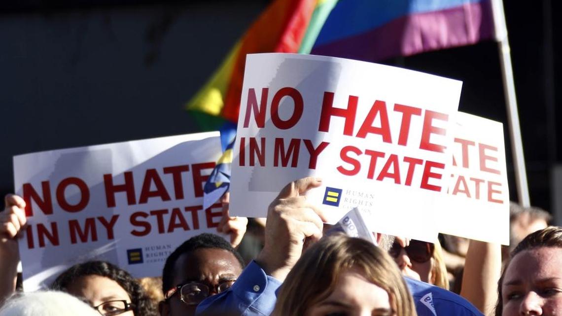 Protesters call for Mississippi Gov. Phil Bryant to veto House Bill 1523, which they says will allow discrimination against LGBT people, during a rally outside the Governor's Mansion in Jackson, Miss., Monday, April 4, 2016. The 5th Circuit Court of Appeals will hear arguments Monday on whether to allow the law to stand.
