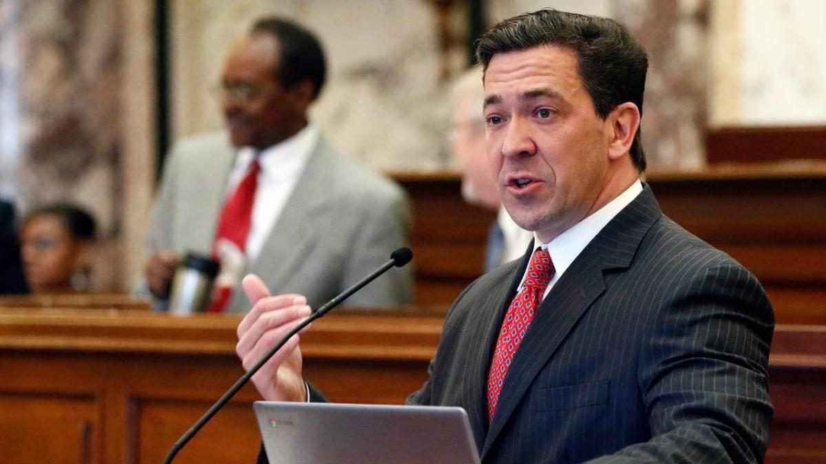 State Sen. Chris McDaniel, R-Ellisville, speaks about one of his amendments during floor debate to the creation of the Asbestos Transparency Trust Act in Senate chambers at the Capitol in Jackson, Miss.. McDaniel, who lost a bitter U.S. Senate race in 2014, says he will "get into a dark place and pray" about whether to run this year.