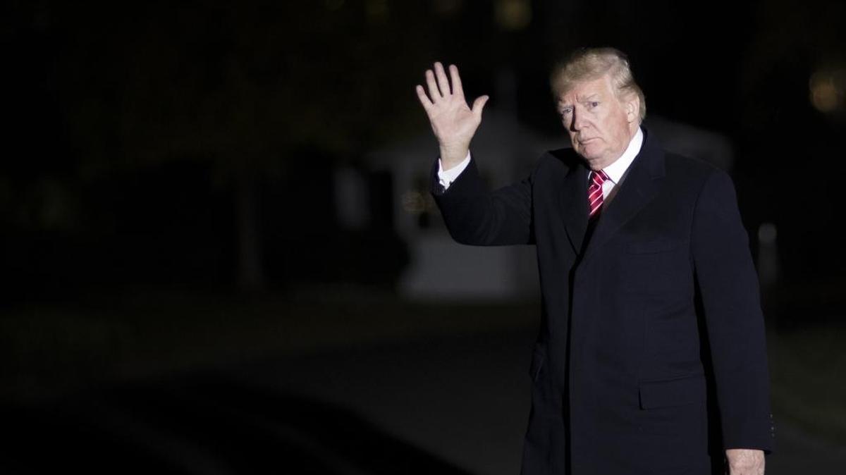 President Donald Trump arrives at the White House in Washington, after spending his Thanksgiving break in Florida at his club, Mar-a Lago, Nov. 26, 2017.